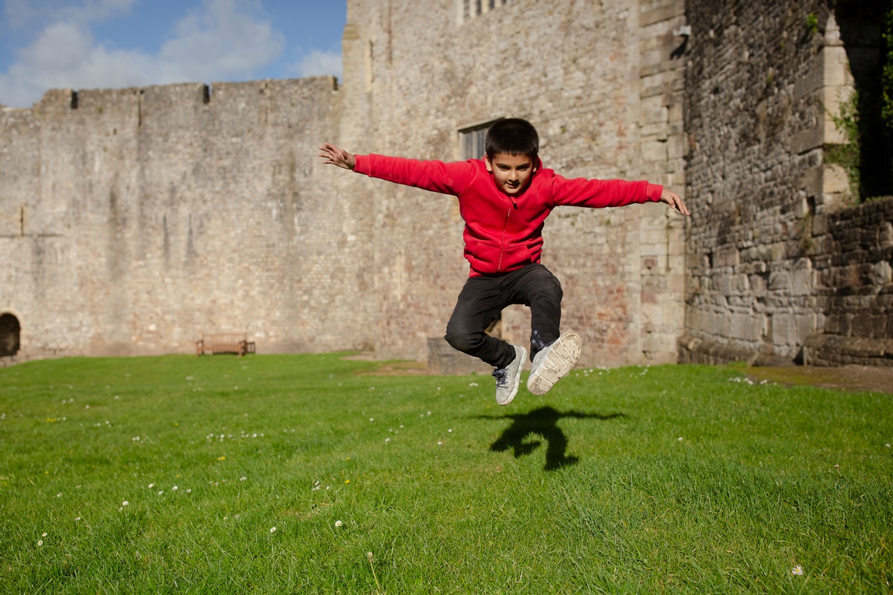 Kid playing in Chepstow castle